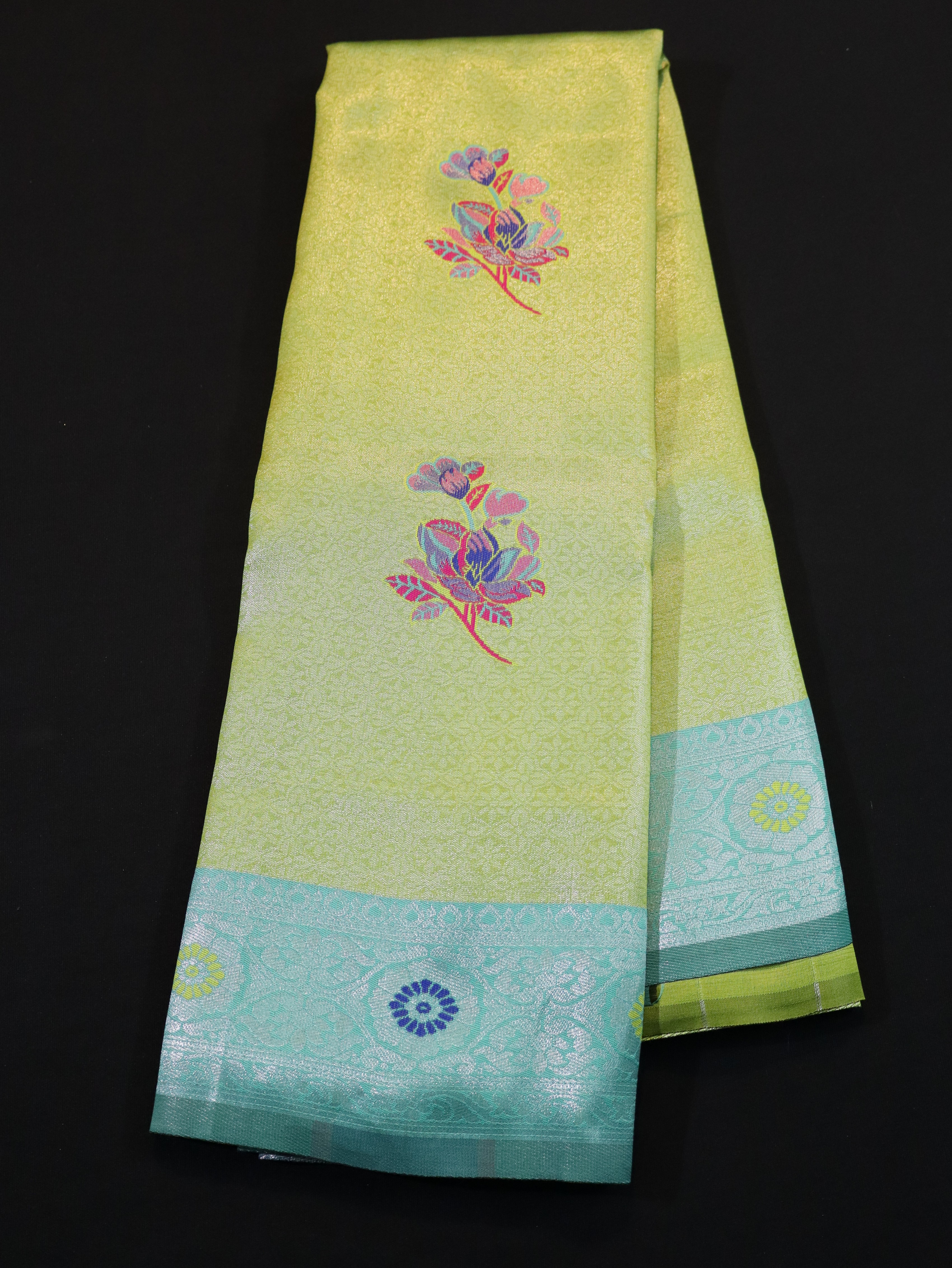 EMBOSSED MEENA BUTTA WITH KANCHI BORDER-RAMAR GREEN