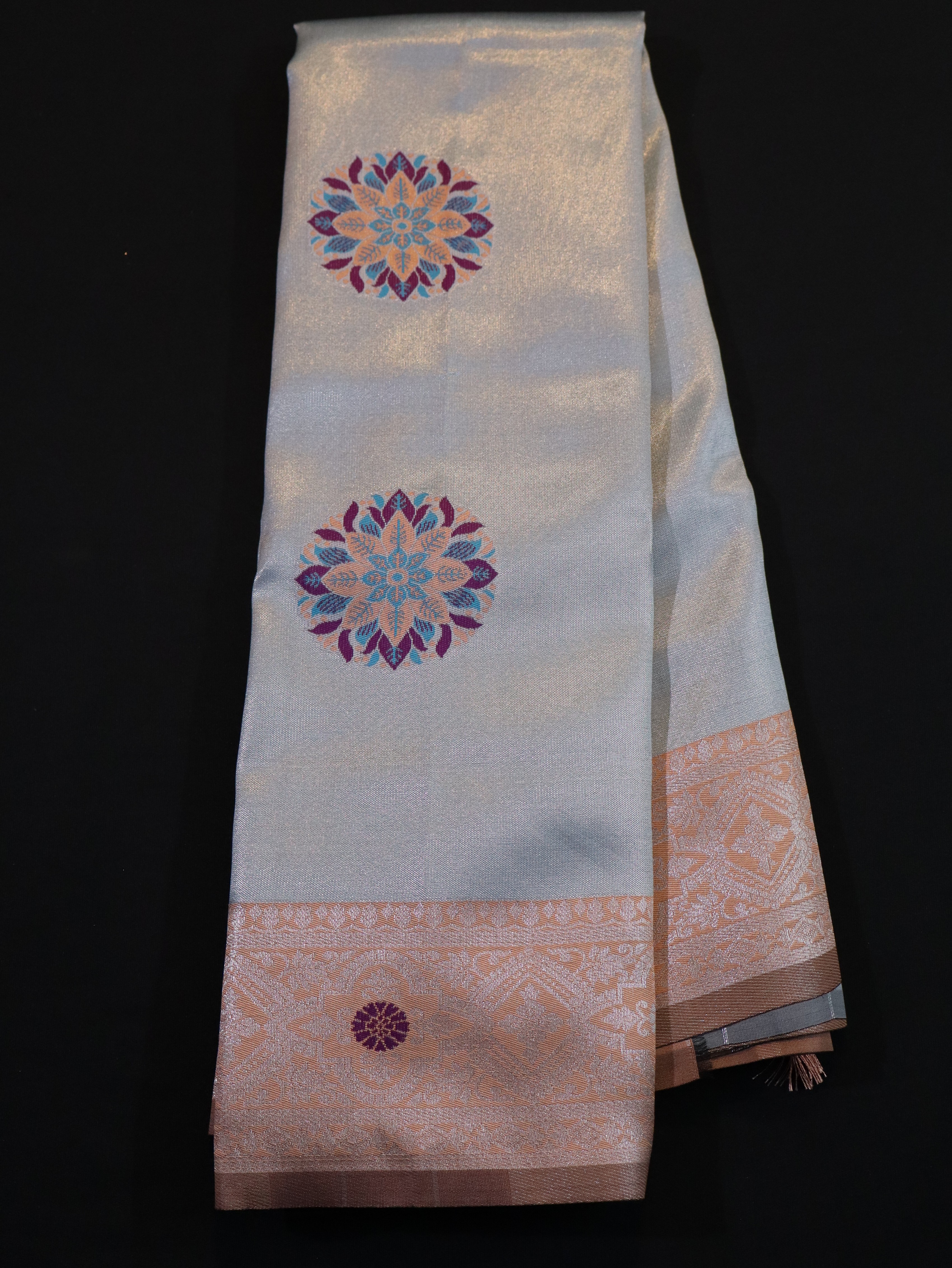 EMBOSSED MEENA BUTTA WITH KANCHI BORDER-GREY/ORANGE