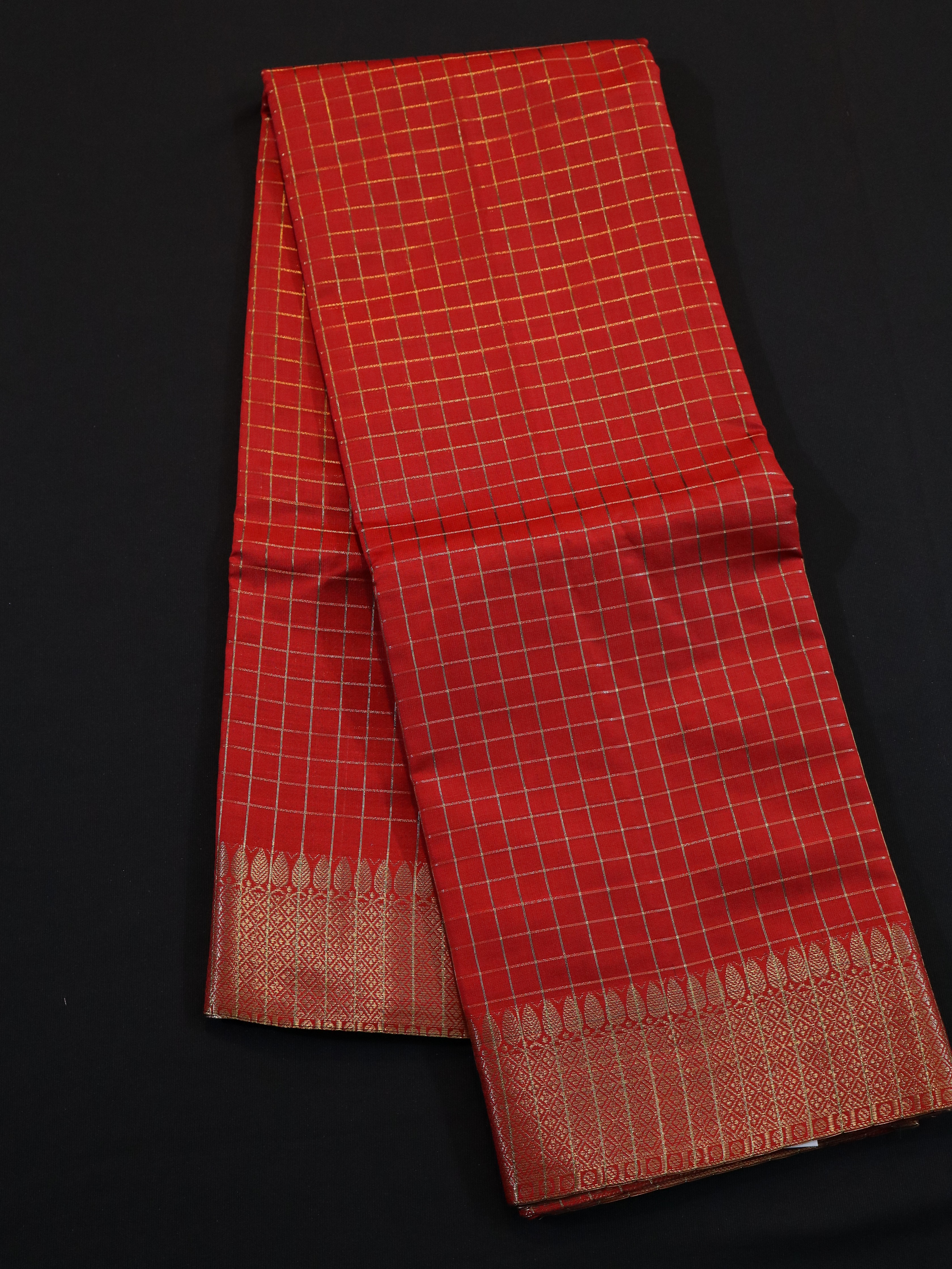 BODY JARI CHECKED WITH TRADITIONAL BORDER-ORANGE RUST